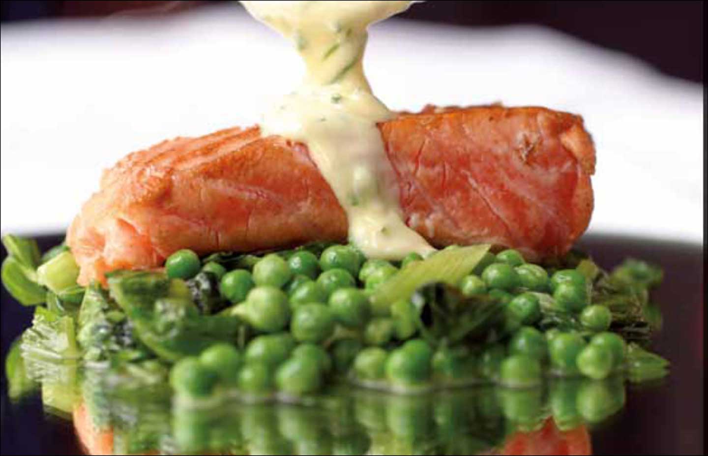 Seared Salmon with Sauté of Peas and Asparagus with Chive Cream